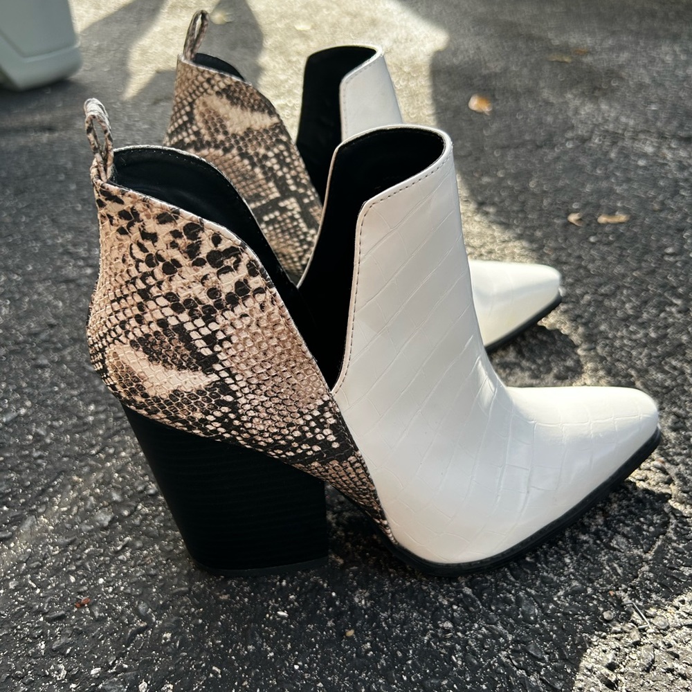 White & snakeskin leather booties
